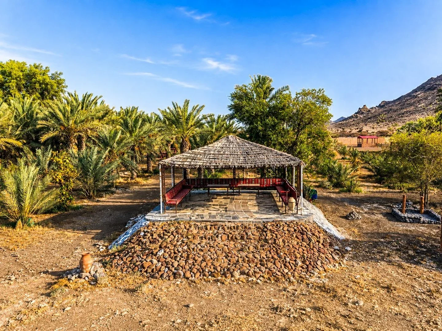 Palm-lined grounds around The Fort